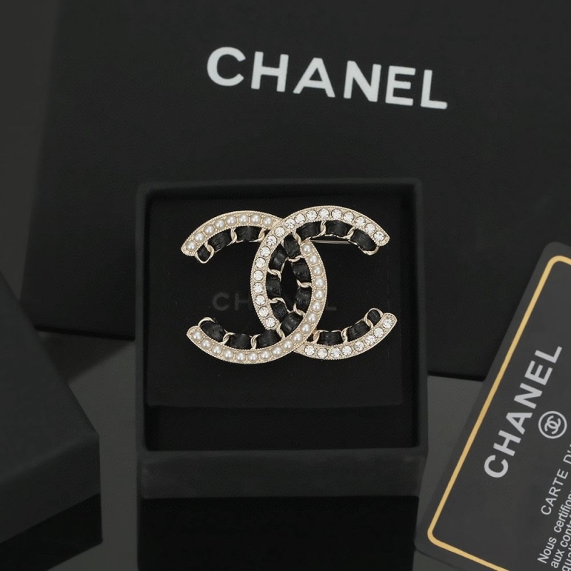 Ch*el brooches